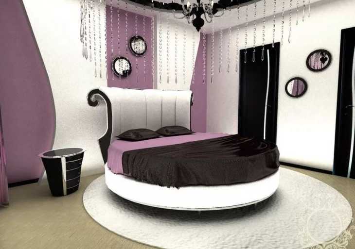 Круглая кровать в интерьере спальной
